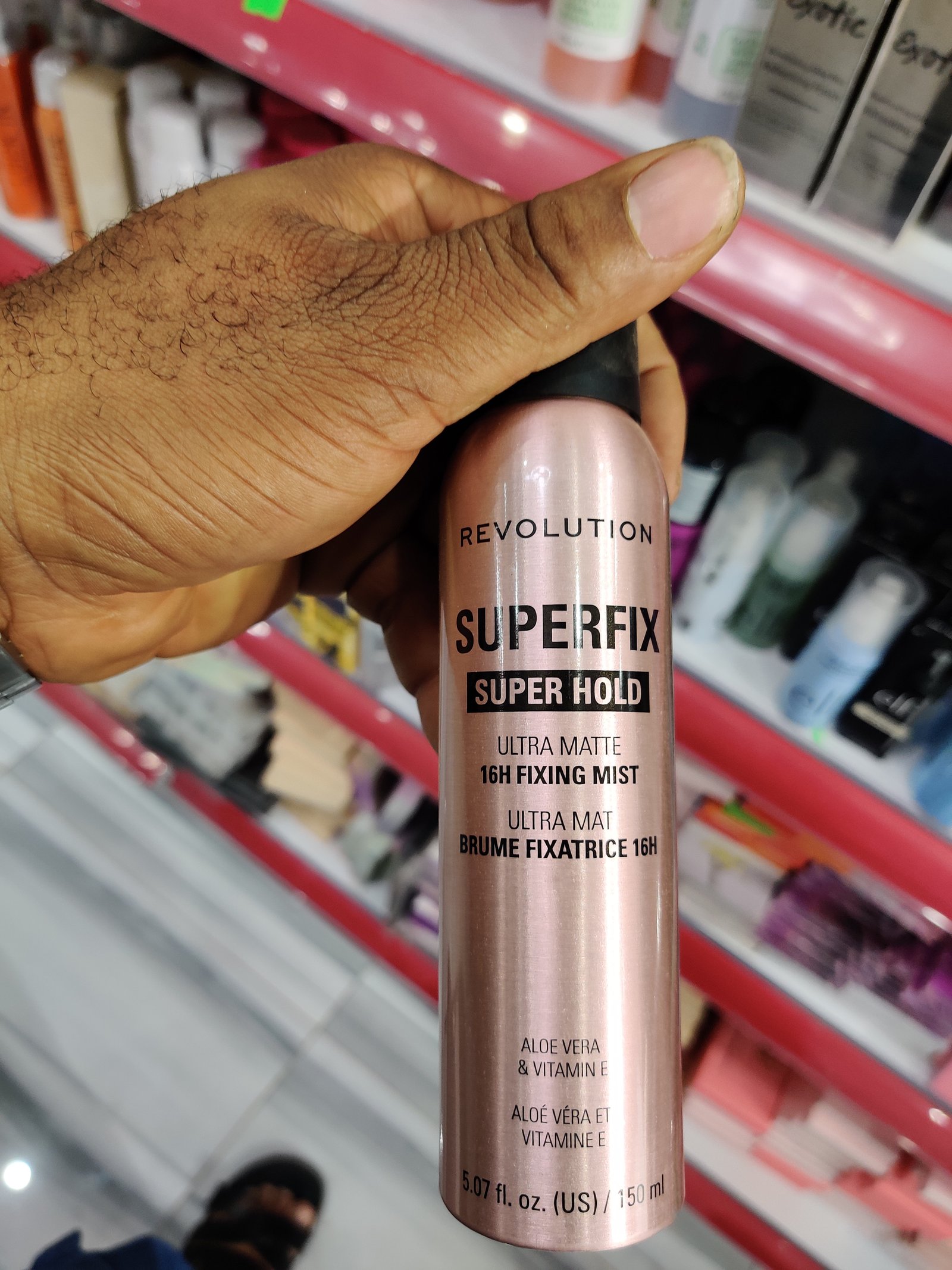 Revolution super hold spray